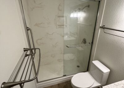 Construction showing completed bathroom renovation